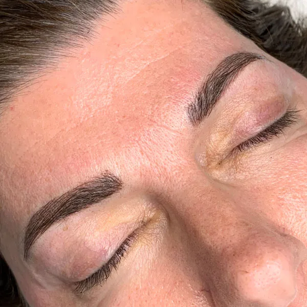 Eyebrow correction after — bold corrected defined brows