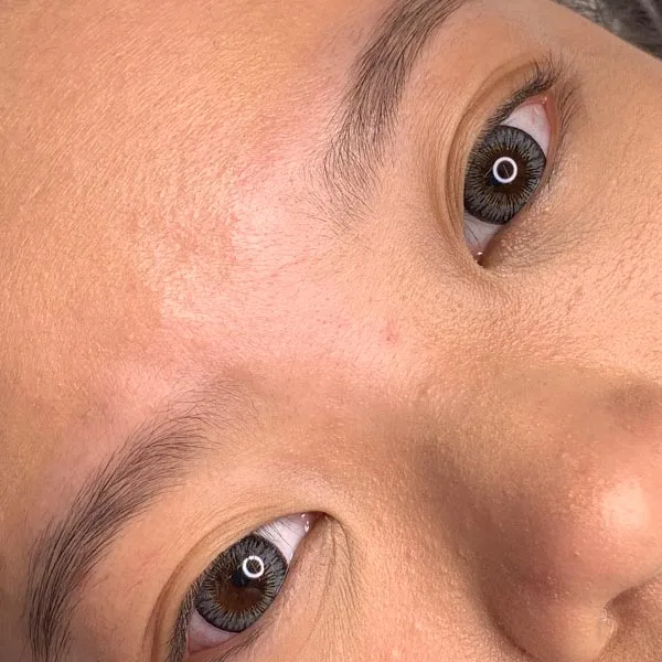 Eyebrow microblading before result — olive skin tone