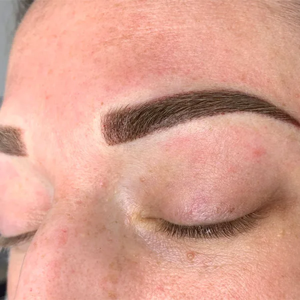 Powder brows after result — bold ombre brows on fair freckled skin